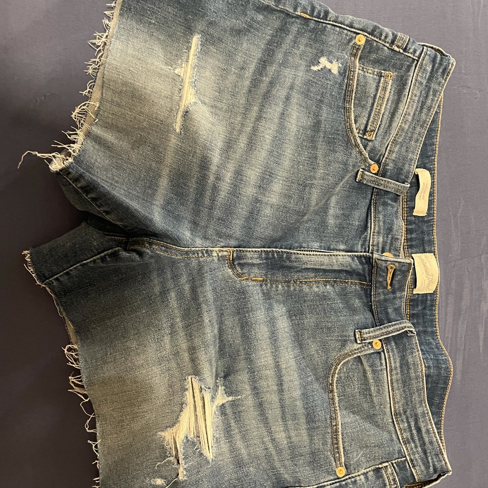 Distressed denim shorts